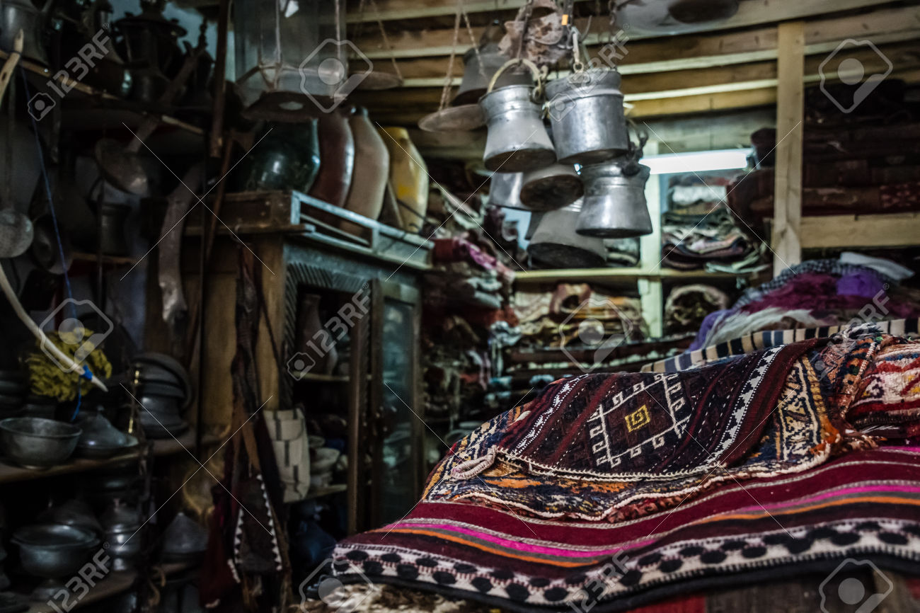 Antique Carpet and Copper Pots for Sale in an Antique Shop